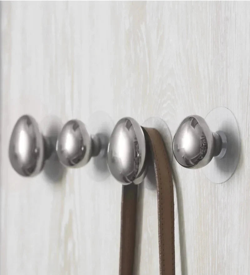 Ganxos de paret Auriën – Disseny de gota de pluja cromat, joc de 2 amb tira adhesiva o cargol