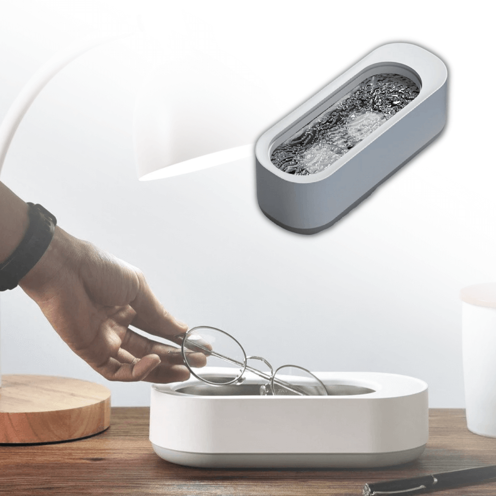 AuraClean – Netejador ultrasònic de ulleres, compacte i segur per a lents