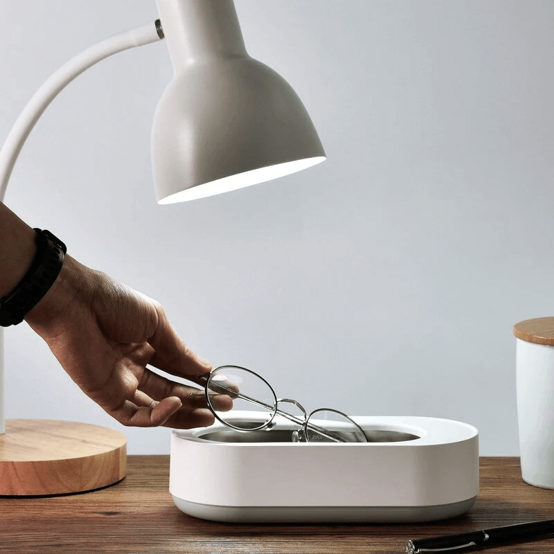 AuraClean – Netejador ultrasònic de ulleres, compacte i segur per a lents