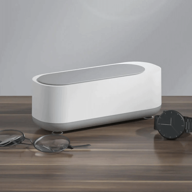 AuraClean – Netejador ultrasònic de ulleres, compacte i segur per a lents