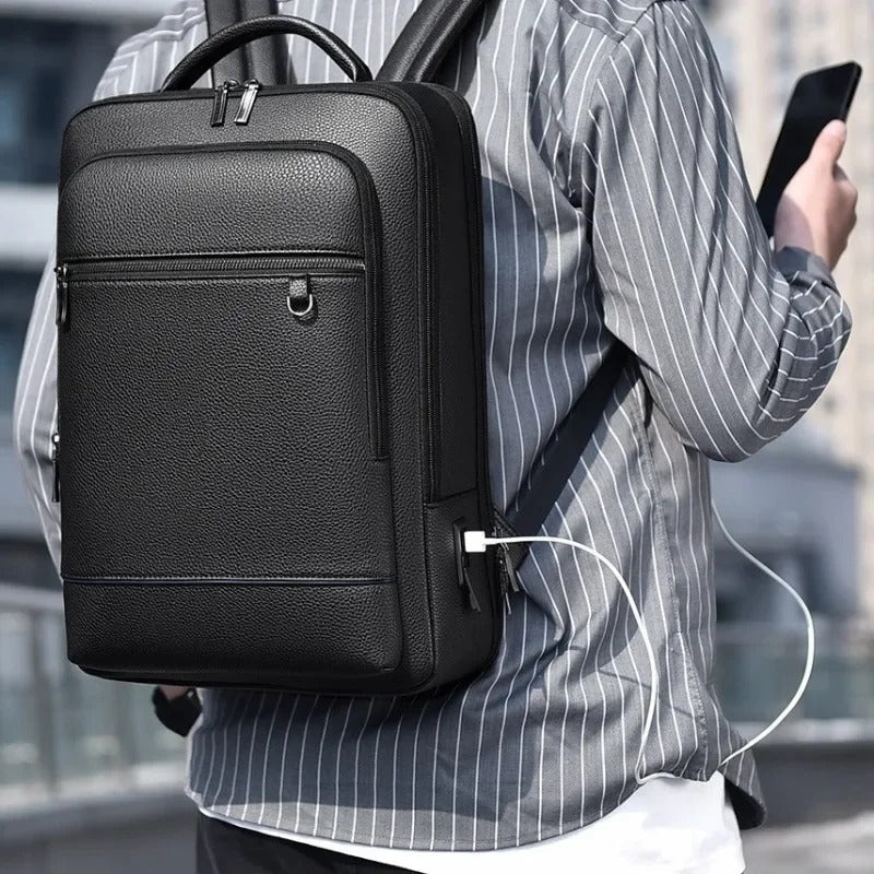Mochila de cuero con USB y compartimento para portátil – Elegante y funcional para hombres