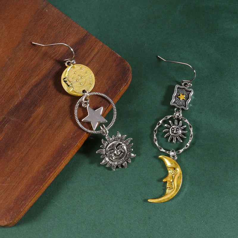 Asymmetrische dames oorbellen met Griekse mythologie zon en maan design in zilver 2