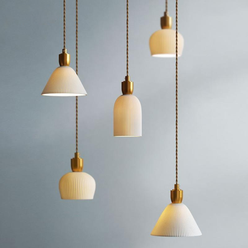 Lampada a sospensione Lumivio – Ceramica piegata e ottone, design moderno in 3 stili