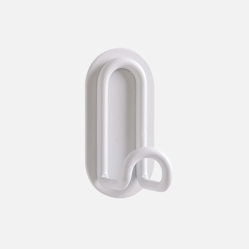 Gancho de pared Zintra – Hierro forjado pastel con tira adhesiva 3M, sin taladrar