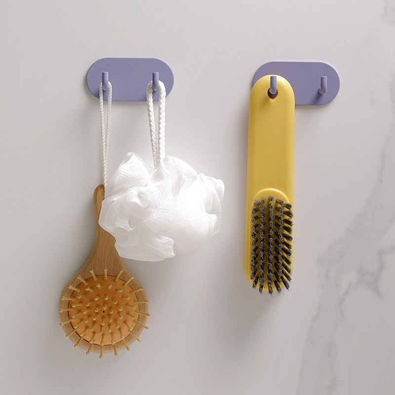 Gancho de pared Zintra – Hierro forjado pastel con tira adhesiva 3M, sin taladrar