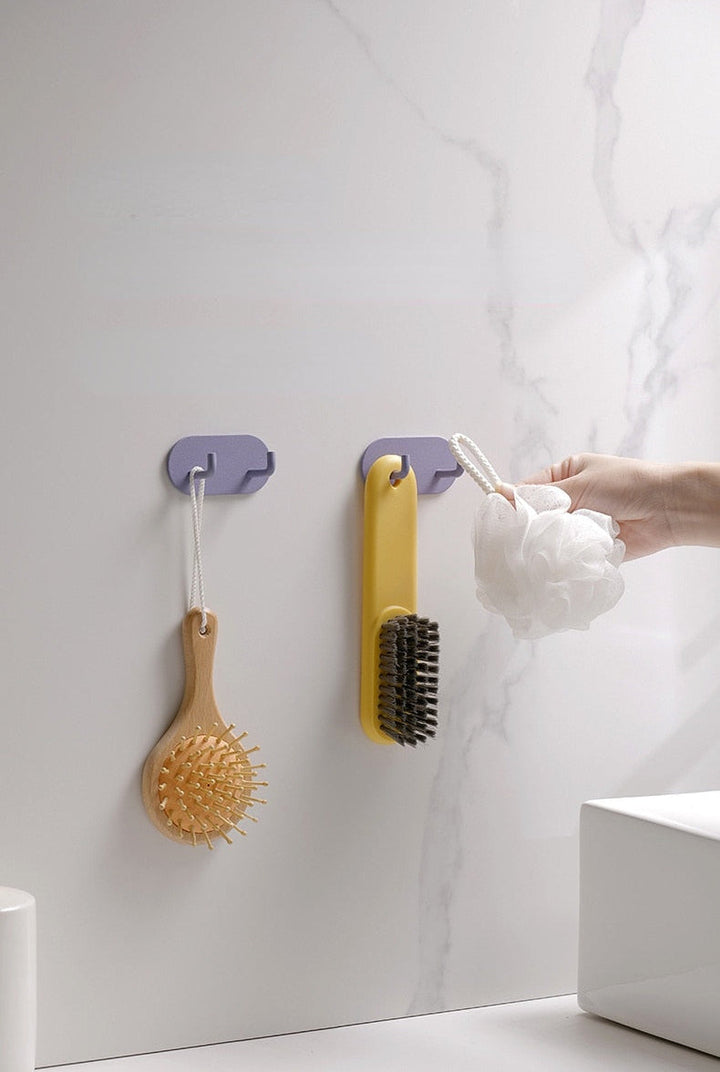 Gancho de pared Zintra – Hierro forjado pastel con tira adhesiva 3M, sin taladrar