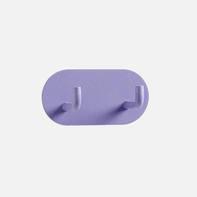 Gancho de pared Zintra – Hierro forjado pastel con tira adhesiva 3M, sin taladrar