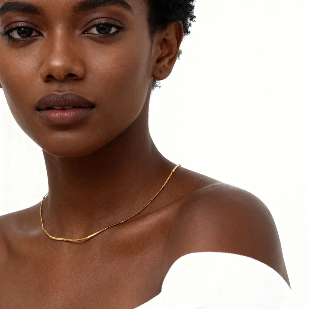 Cadena de serpiente para mujer: pulsera o collar de acero inoxidable en color dorado
