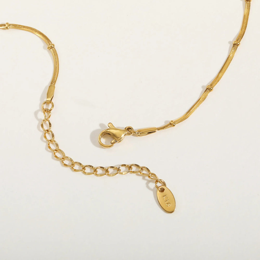 Cadena de serpiente para mujer: pulsera o collar de acero inoxidable en color dorado