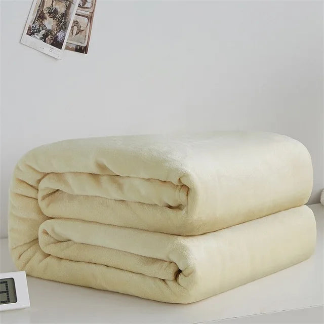 CuddleNest – Manta de forro polar coral ligera – Bebé, sofá y cama