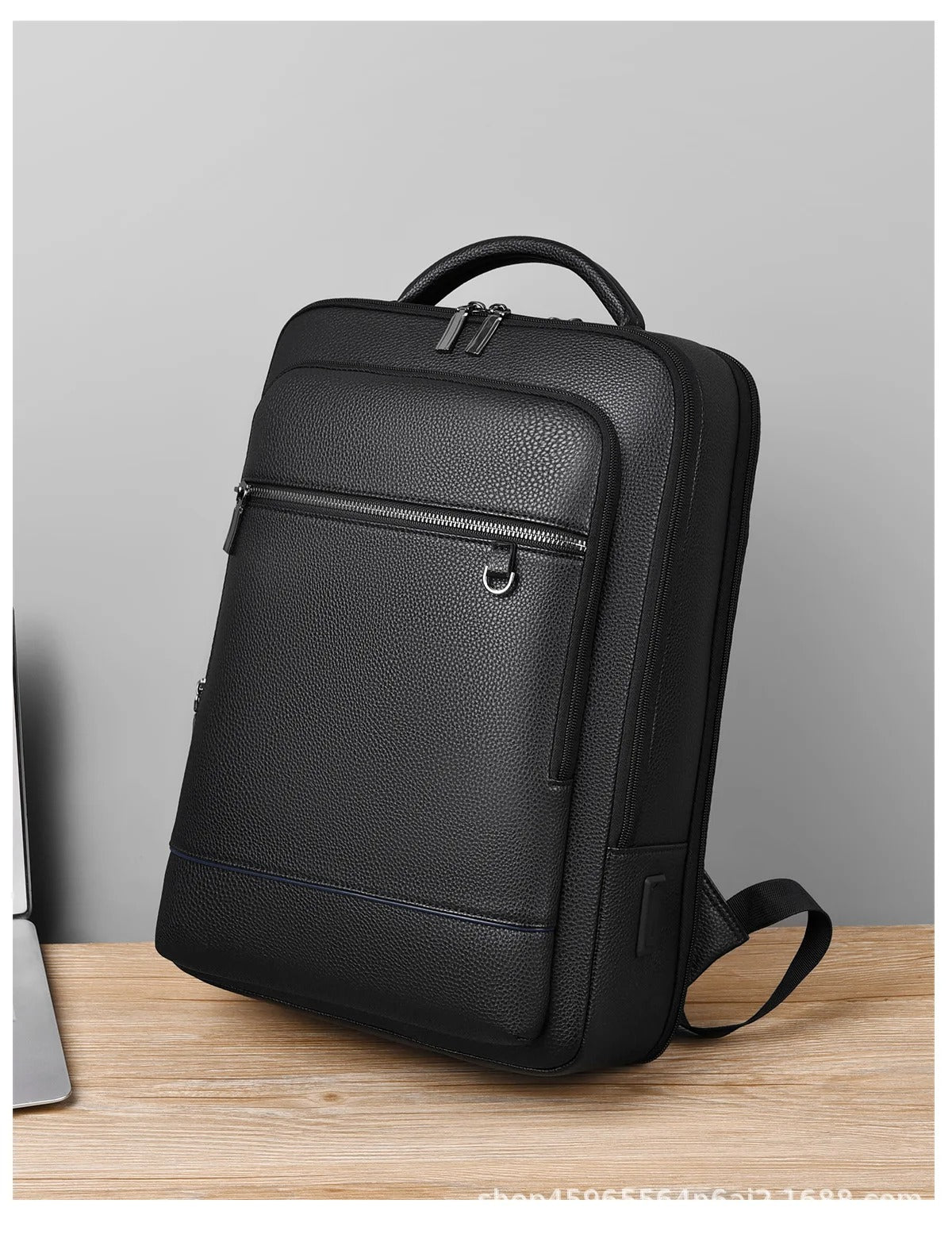 Mochila de cuero con USB y compartimento para portátil – Elegante y funcional para hombres